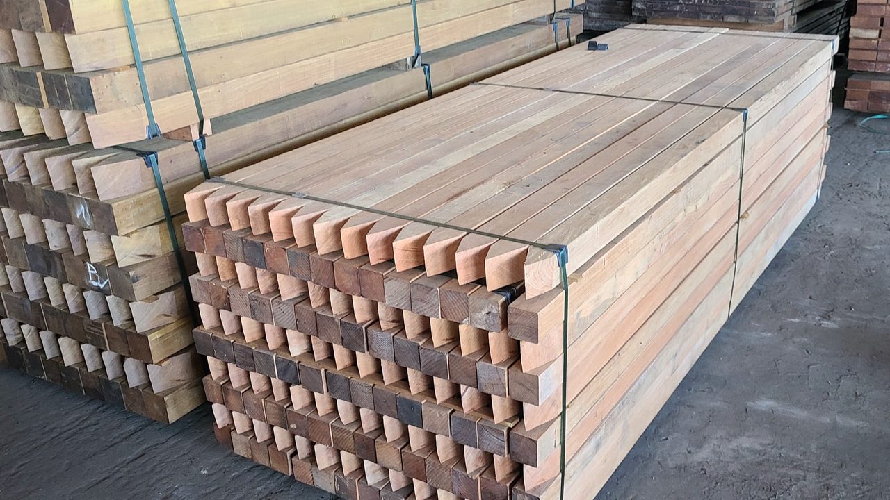 Strapped packs of sawn Surinamese timber prepared for export